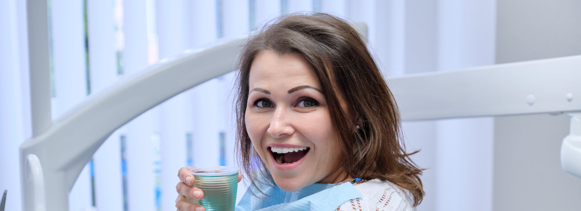 A beautiful woman is smiling.